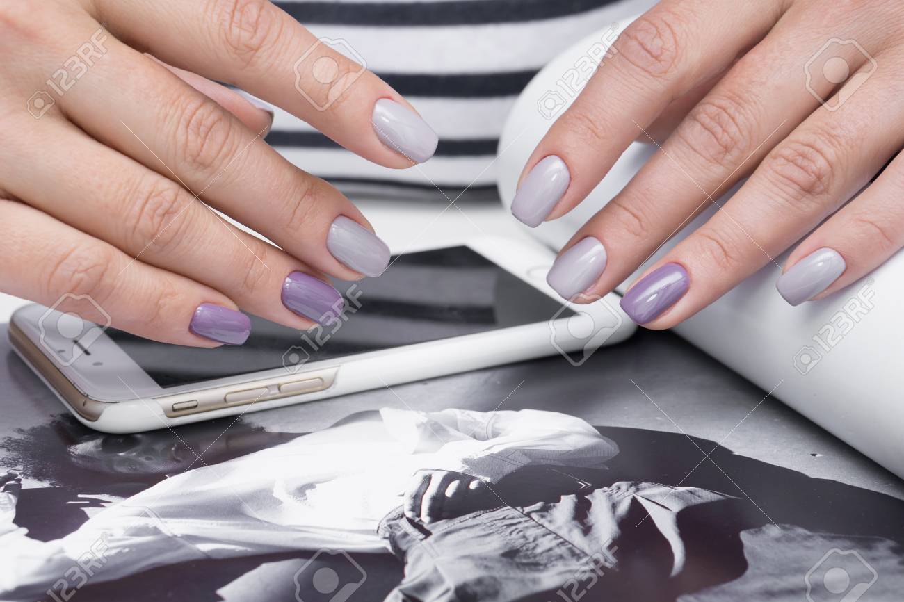 Beautiful natural nails and attractive manicure on women hands. - 92905815 Beautiful natural nails and attractive manicure on women hands. - 92905815