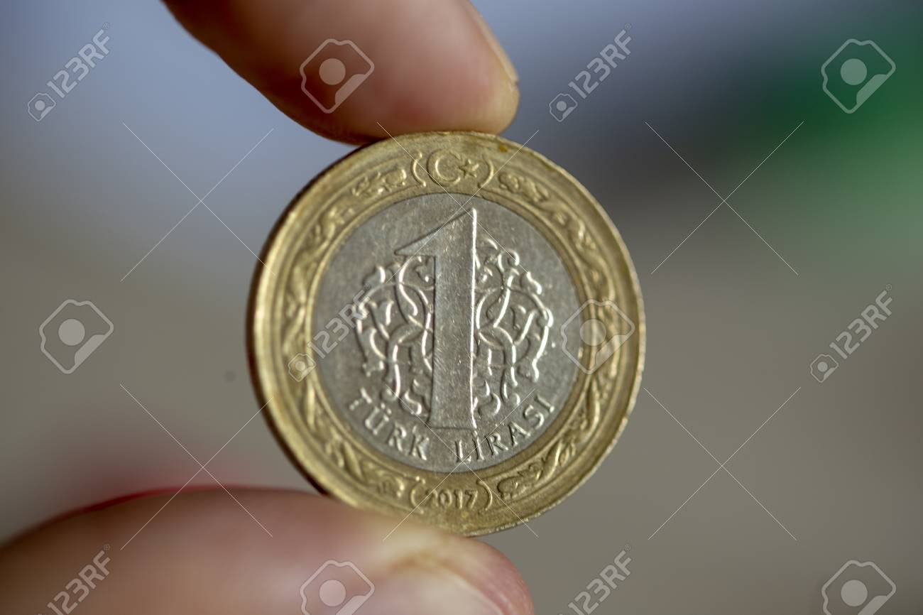 1 Turkish Lira Coin 2017 Obverse On Blurred Background. Finger Tips. Stock  Photo, Picture and Royalty Free Image. Image 107589254.