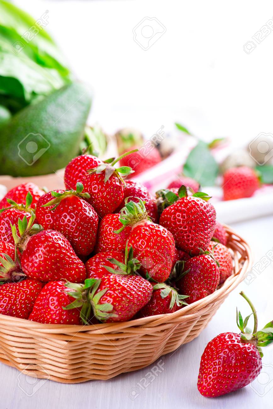 fresh strawberry in the basket on white wooden table - 58050339 fresh strawberry in the basket on white wooden table - 58050339