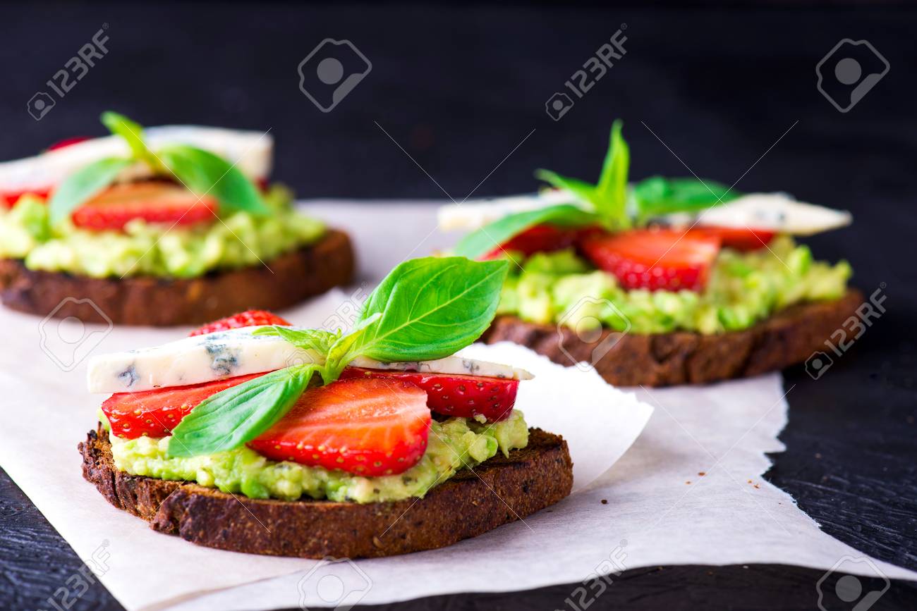 Sandwich with strawberry on white craft paper - 58050372 Sandwich with strawberry on white craft paper - 58050372