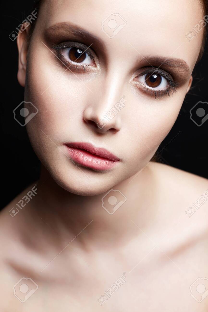 beautiful girl with big brown eyes. young woman with clean skin face. Beauty Fashion Portrait - 129149026 beautiful girl with big brown eyes. young woman with clean skin face. Beauty Fashion Portrait - 129149026