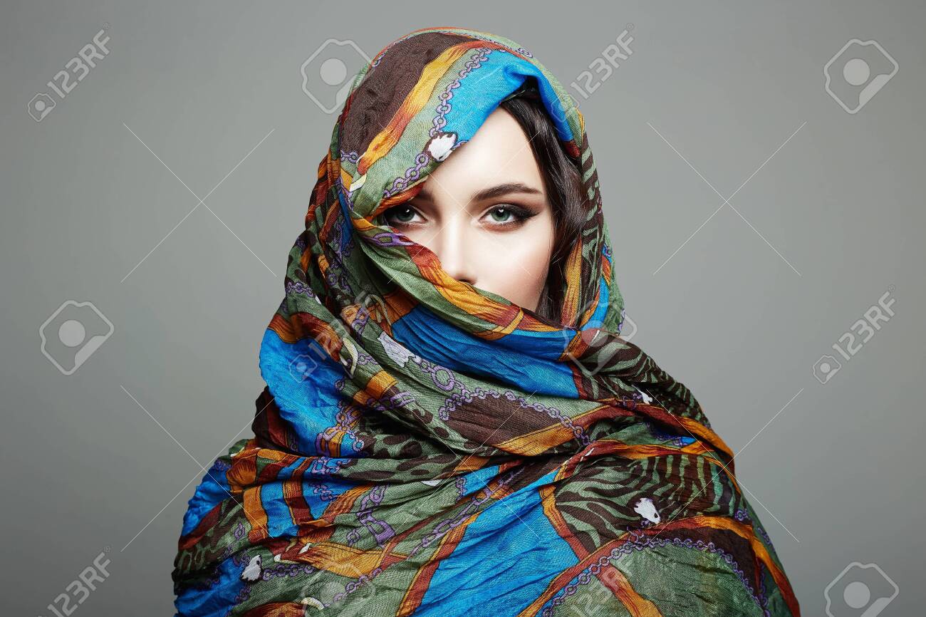 Beautiful Woman In Color Veil. Beauty 