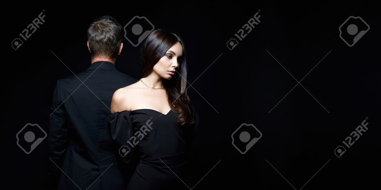 beautiful woman together with a man in a suit. Relationship concept photo. Couple treason - 164624136 beautiful woman together with a man in a suit. Relationship concept photo. Couple treason - 164624136