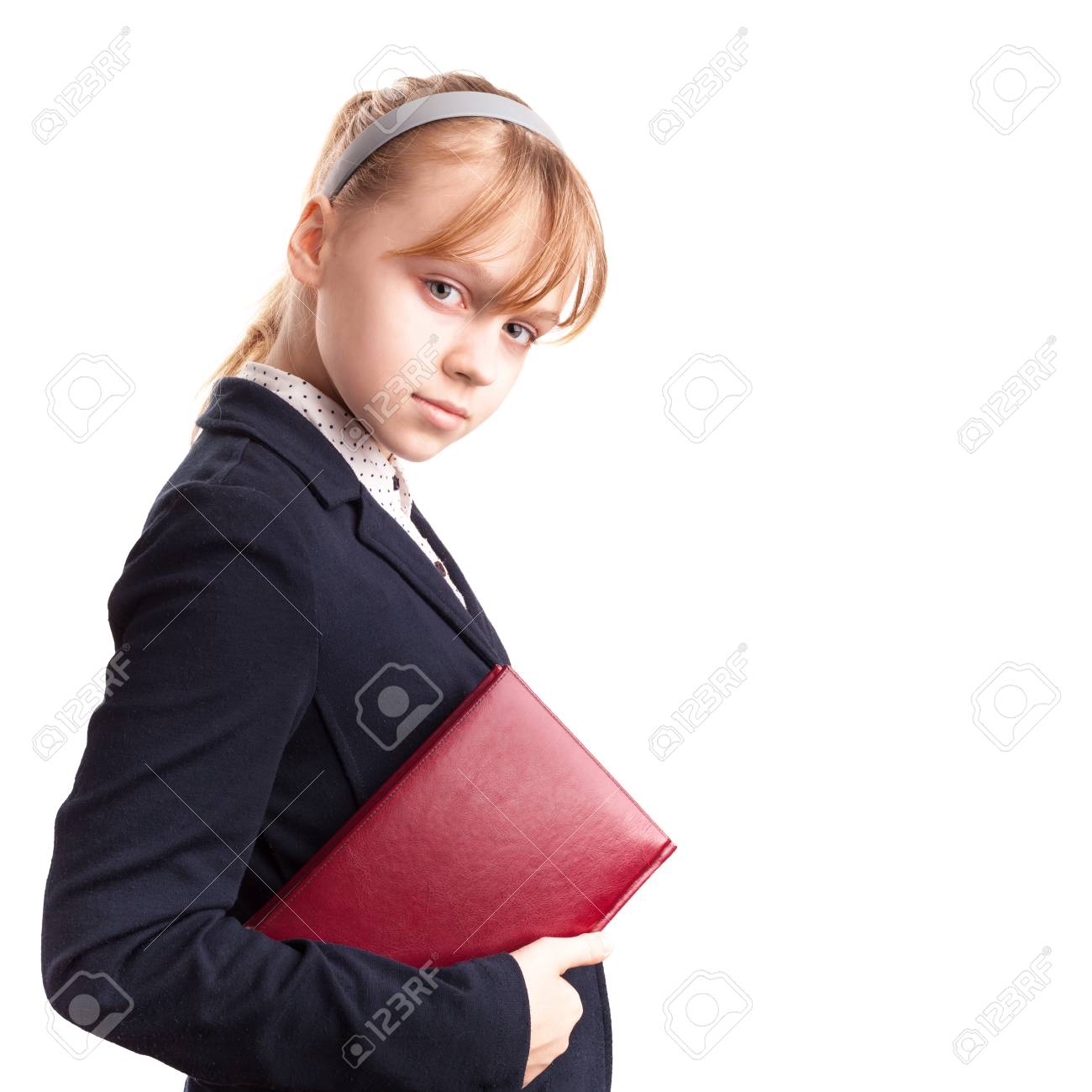 金髪白人女子高生白で隔離赤い本の肖像画 の写真素材 画像素材 Image