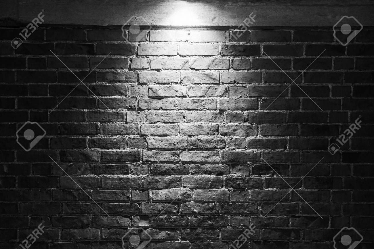 grungy dark brick wall