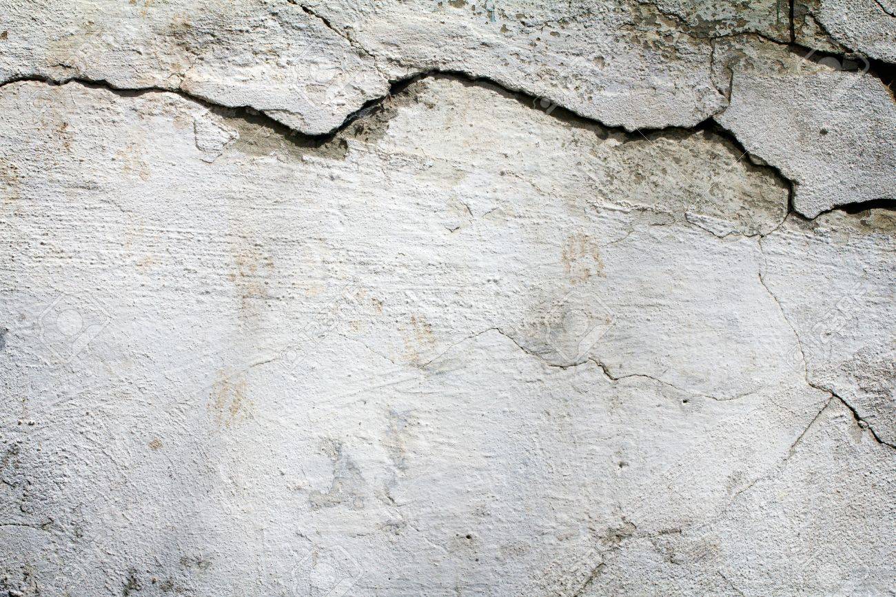 Grunge muro di cemento armato con crack texture di sfondo foto ... Carta da parati effetto cemento armato