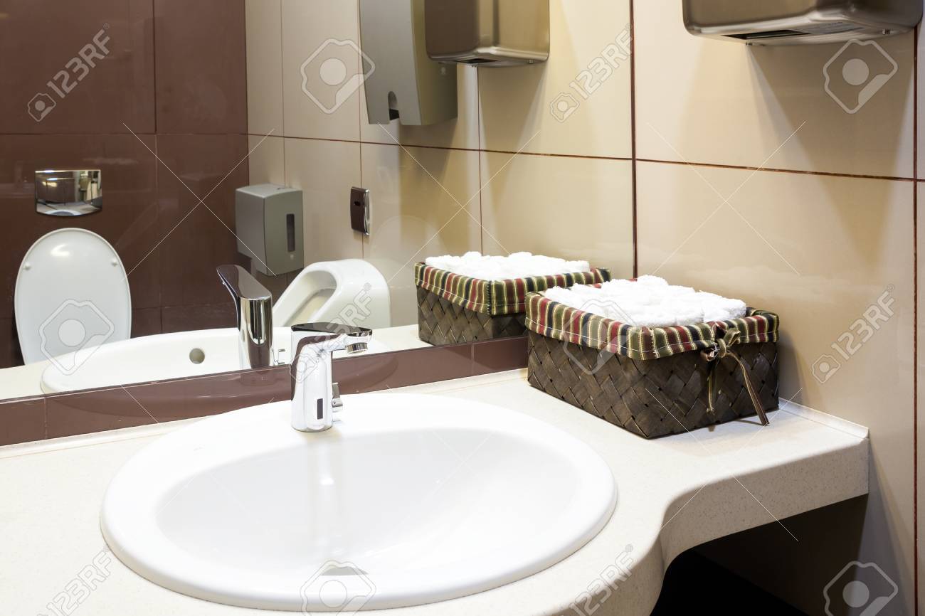 A Close Up Of A Modern White Sink