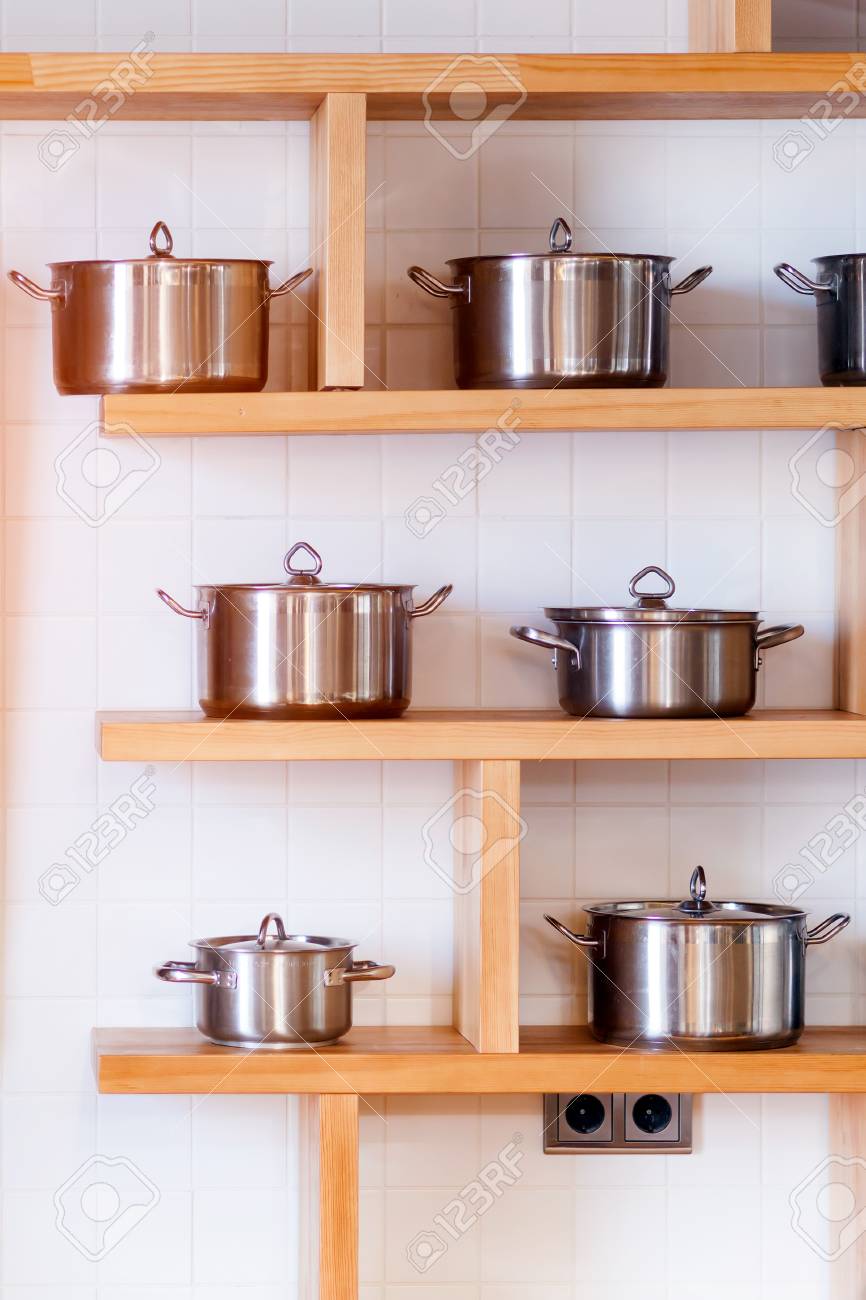 Beautiful Modern Mettalic New Pans Of Different Sizes Stand On Stock Photo Picture And Royalty Free Image Image 96772906
