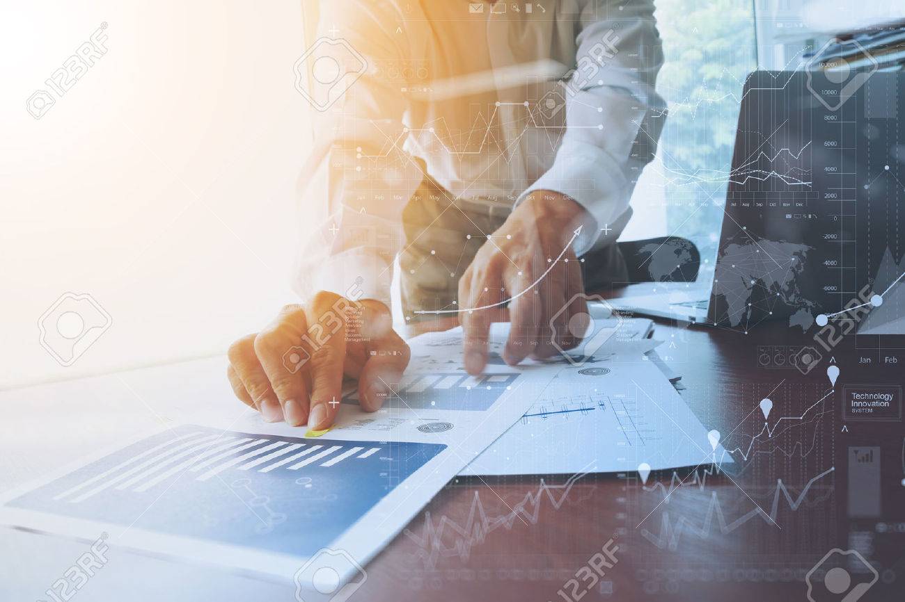 business documents on office table with smart phone and digital tablet and graph business with social network diagram and man working in the background - 51495797 business documents on office table with smart phone and digital tablet and graph business with social network diagram and man working in the background - 51495797