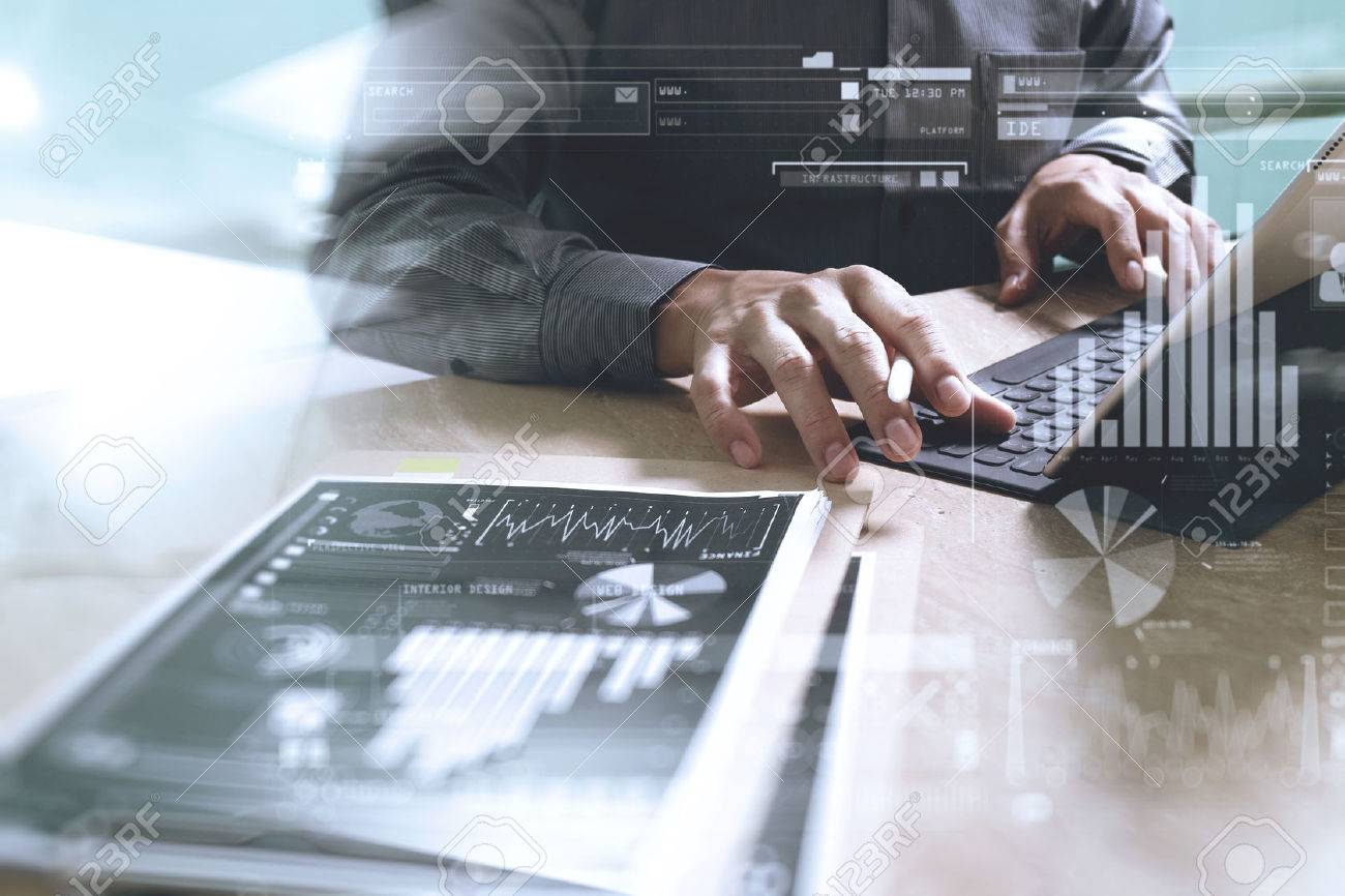 Businessman hand working concept. Documents finance graphic chart. Digital tablet keyboard dock screen computer design smart phone using. Eyeglass on marble desk. Sun flare effect - 62689445 Businessman hand working concept. Documents finance graphic chart. Digital tablet keyboard dock screen computer design smart phone using. Eyeglass on marble desk. Sun flare effect - 62689445