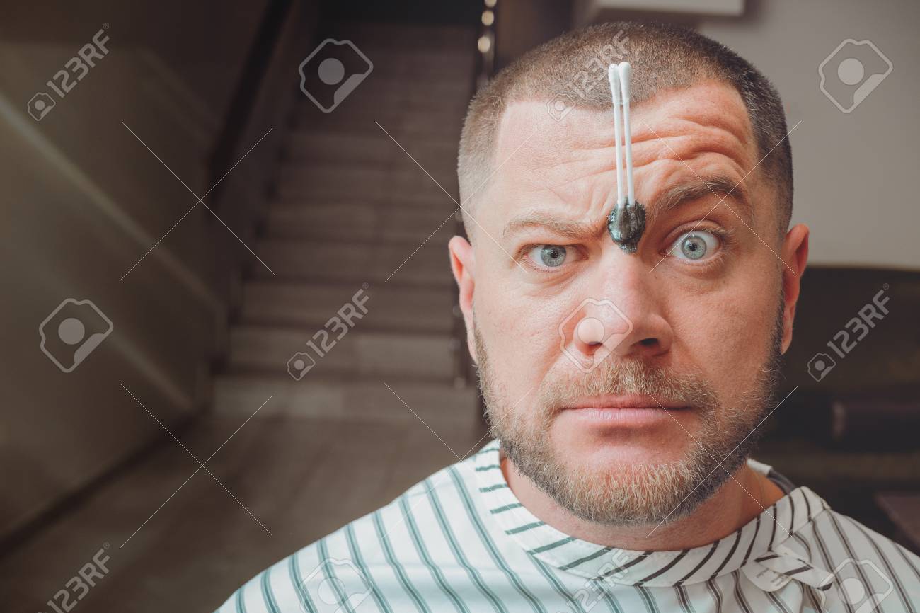 Wax Hair Removal Of Male Eyebrows Overgrown Eyebrows Stock Photo