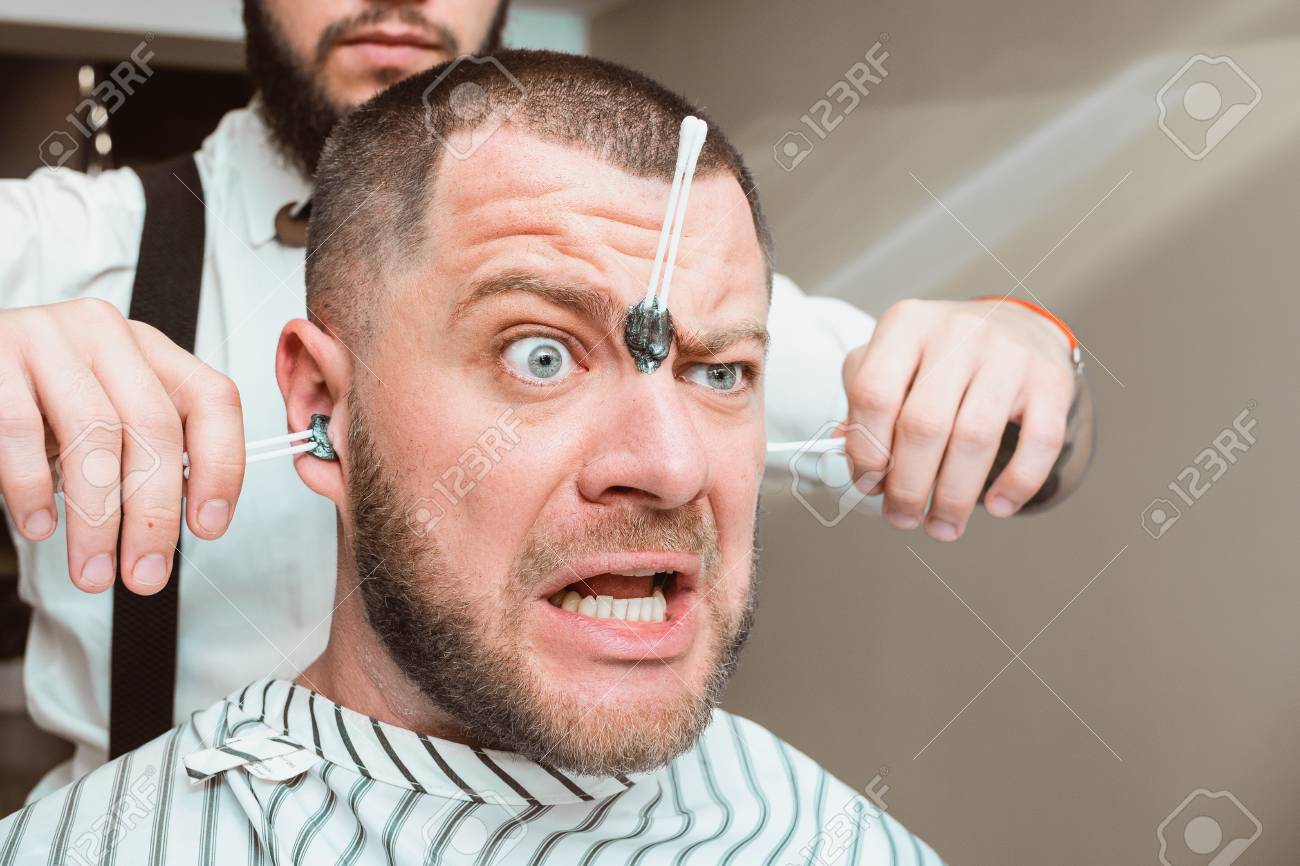 Waxing Hair Removal In The Ears Pulling Hair From Ears Stock