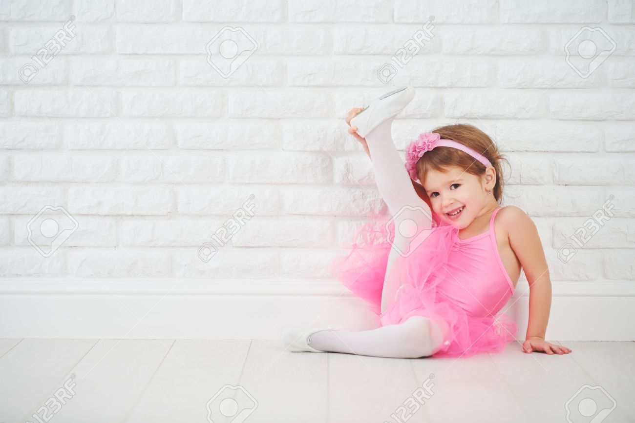 child little girl dancer ballet ballerina stretching stock photo