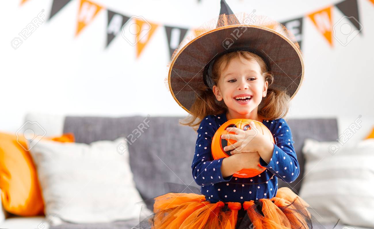 happy laughing child girl in witch costume to halloween - 85924124 happy laughing child girl in witch costume to halloween - 85924124