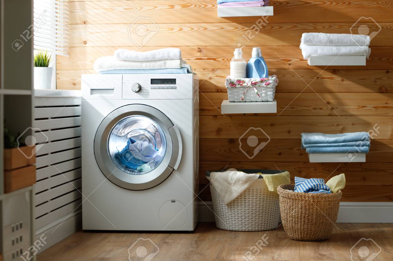 Interior of a real laundry room with a washing machine at the window at home - 98703637 Interior of a real laundry room with a washing machine at the window at home - 98703637