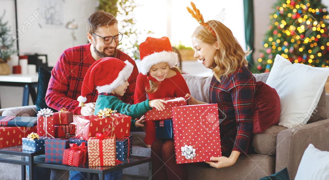 Opening Christmas Gifts 2022 Happy Family Parents And Children Open Presents On Christmas Morning Stock  Photo, Picture And Royalty Free Image. Image 111796603.