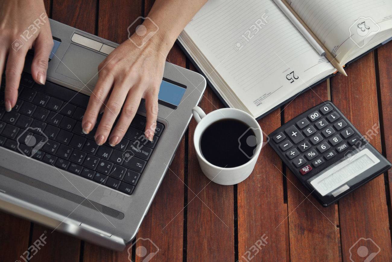 woman working quietly on your terrace with a coffee - 23223430 woman working quietly on your terrace with a coffee - 23223430