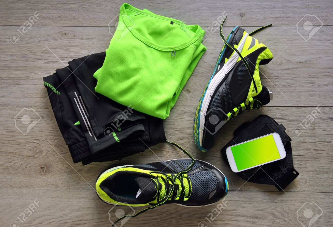 Clothes make running with isotonic drink, phone and T-shirt - 37189700 Clothes make running with isotonic drink, phone and T-shirt - 37189700