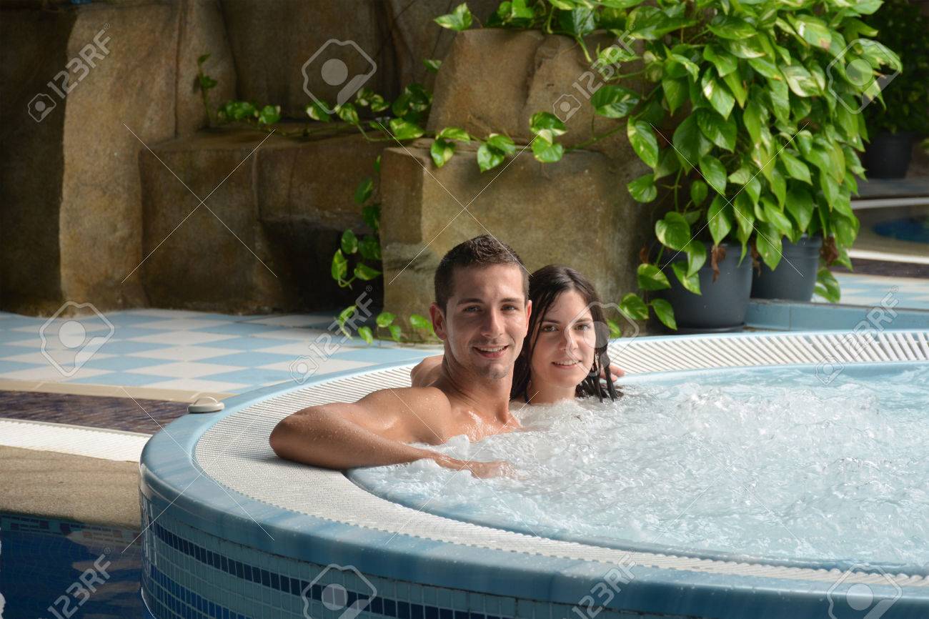 couple in love in jacuzzi enjoying a hydrotherapy session - 48357914 couple in love in jacuzzi enjoying a hydrotherapy session - 48357914
