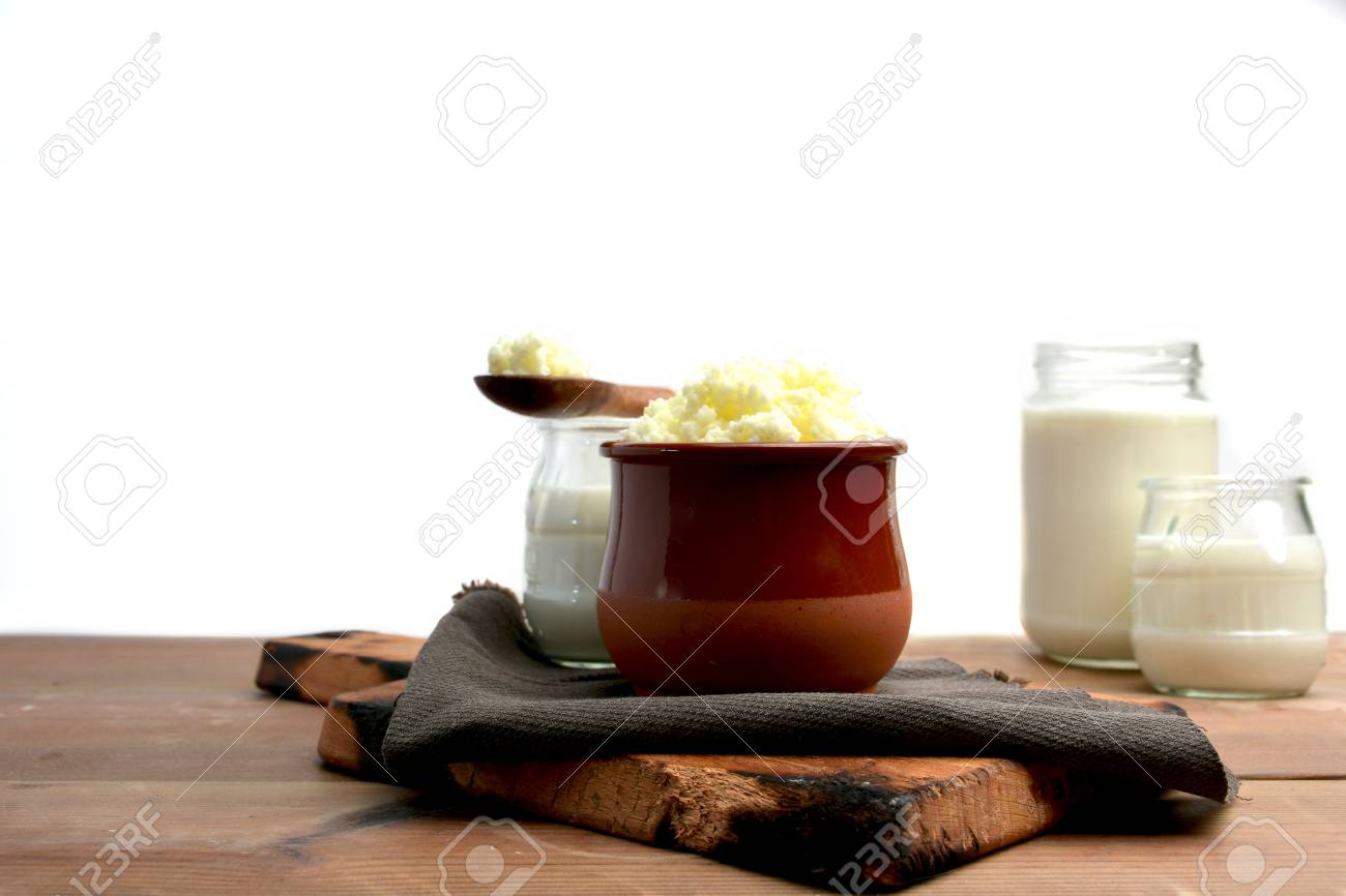 glasses full of keffir, milk and yogurt liquid on bottom white - 69912231 glasses full of keffir, milk and yogurt liquid on bottom white - 69912231