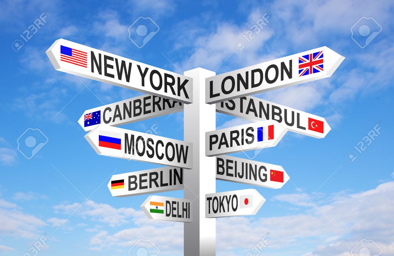 World capital cities and flags signpost against blue sky - 35484784 World capital cities and flags signpost against blue sky - 35484784