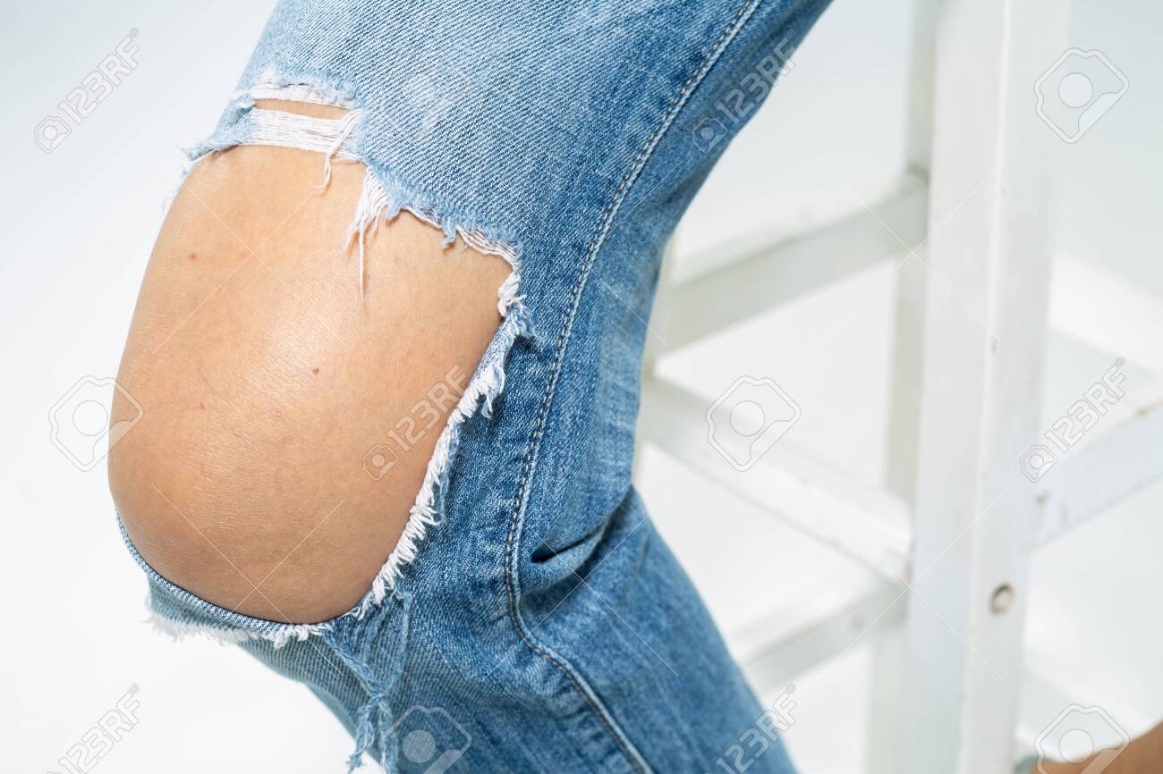 knee torn jeans