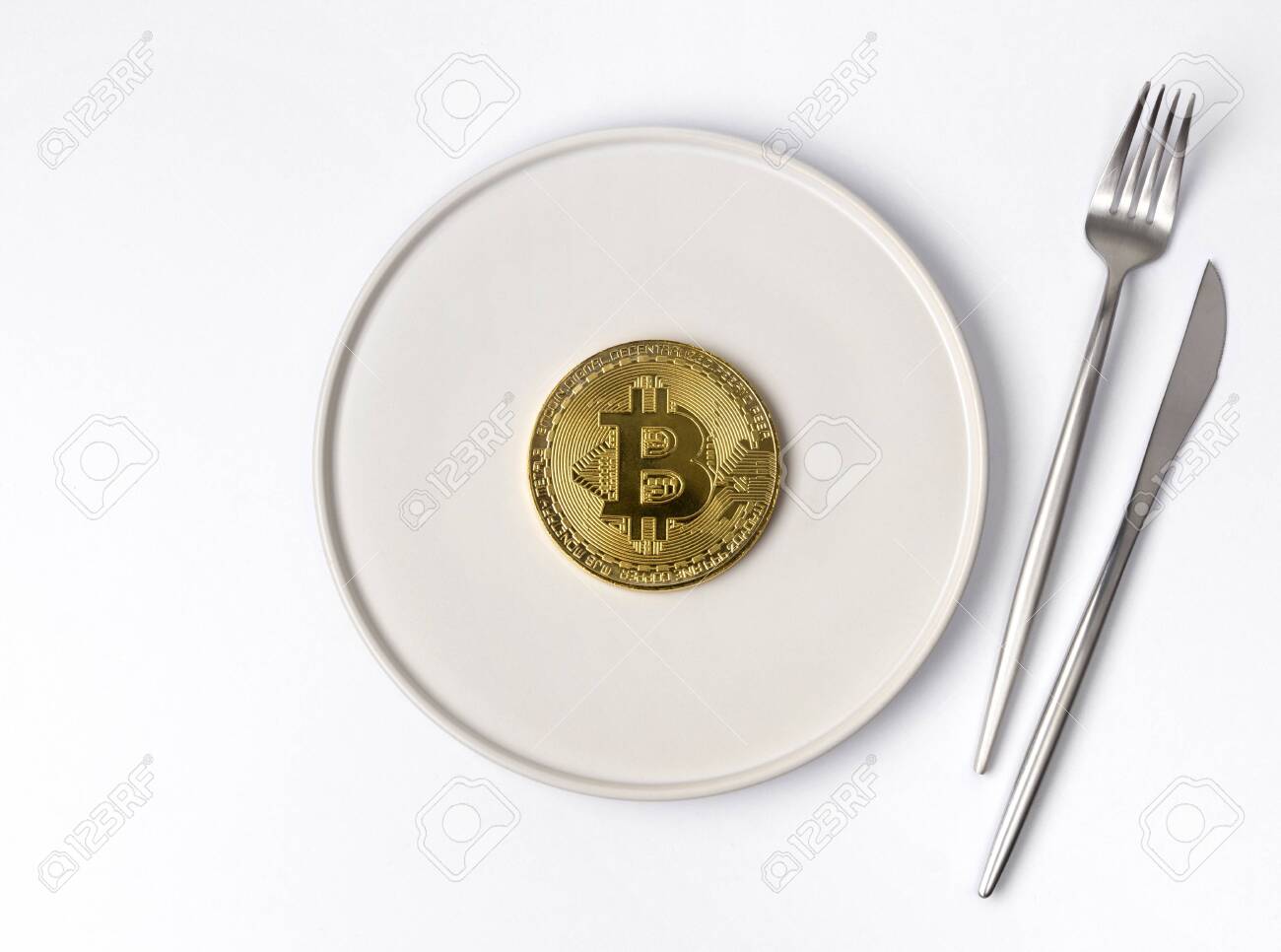Gold Coin Bitcoin Served On White Empty Plate With Fork And Knife Stock  Photo, Picture and Royalty Free Image. Image 127424607.