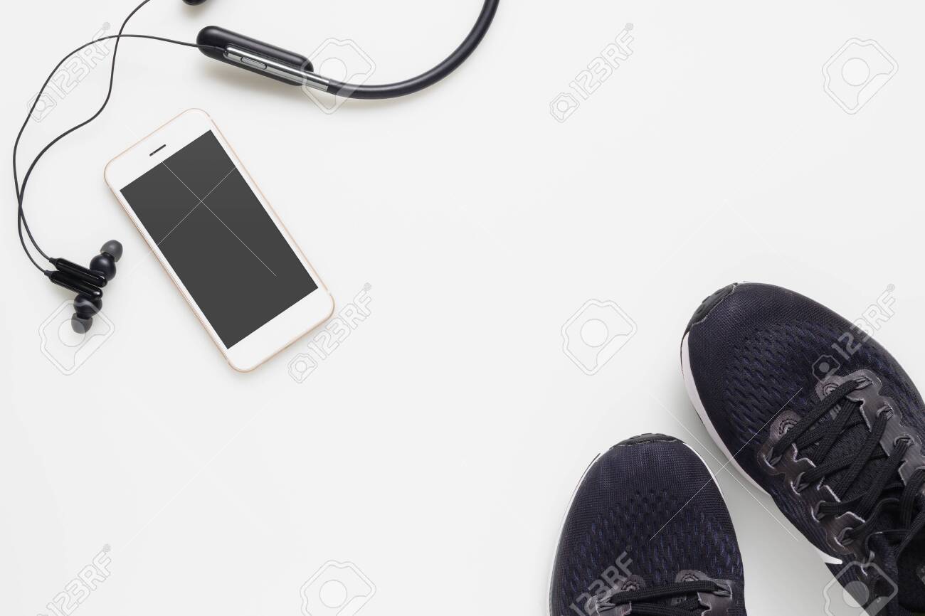 Download Mockup Mobile Cellphone With Wireless Earphone And Running Shoes On White Background Healthy Active Lifestyles Background Concept Daily Workout And Relax Music Lifestyles Stock Photo Picture And Royalty Free Image Image 125140003