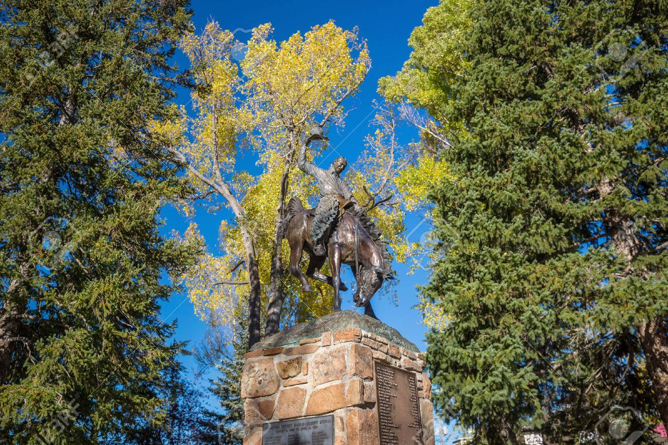 rodeo cowboy sculpture in jackson town square jackson hole stock