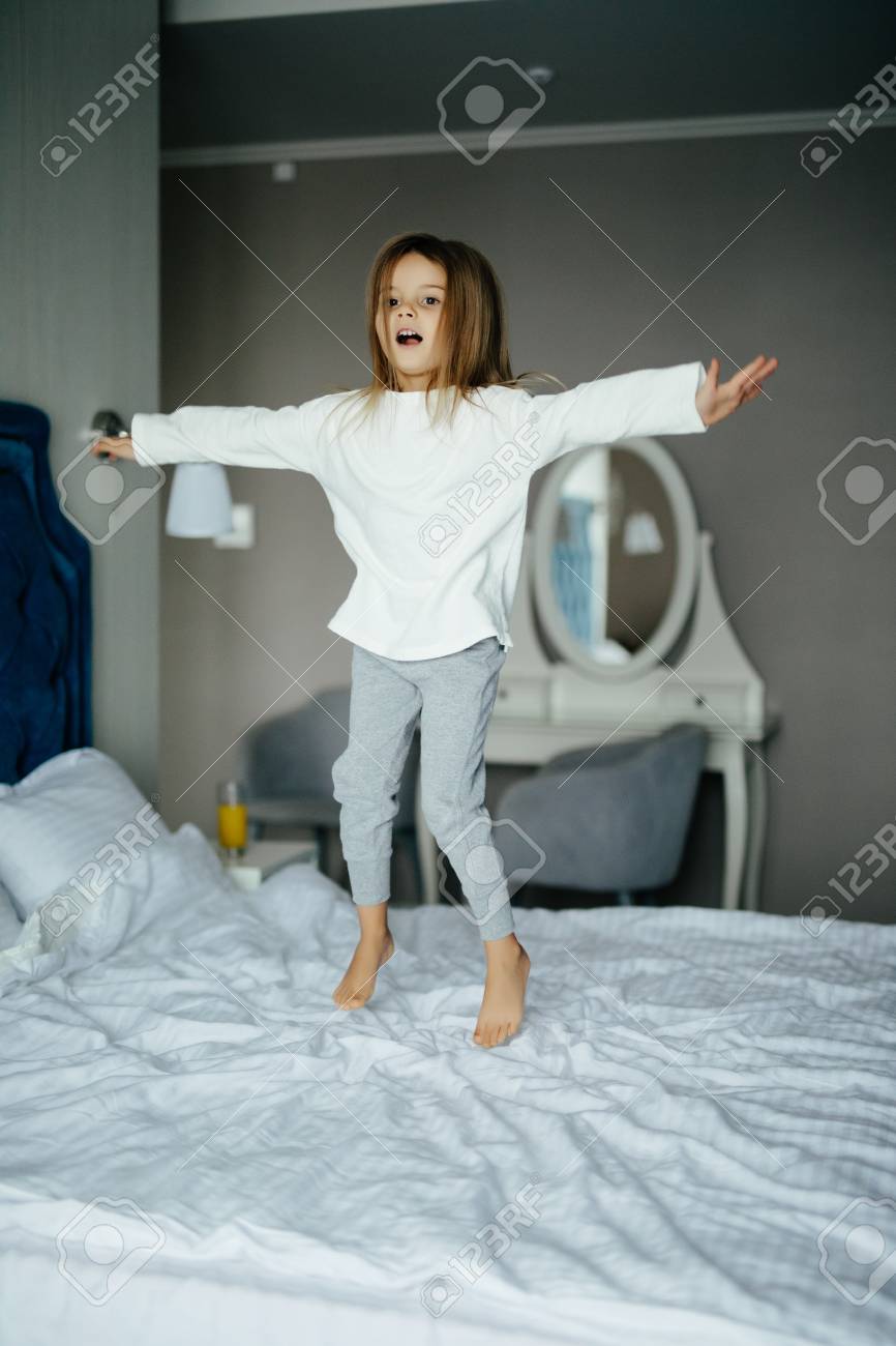 white bed for little girl