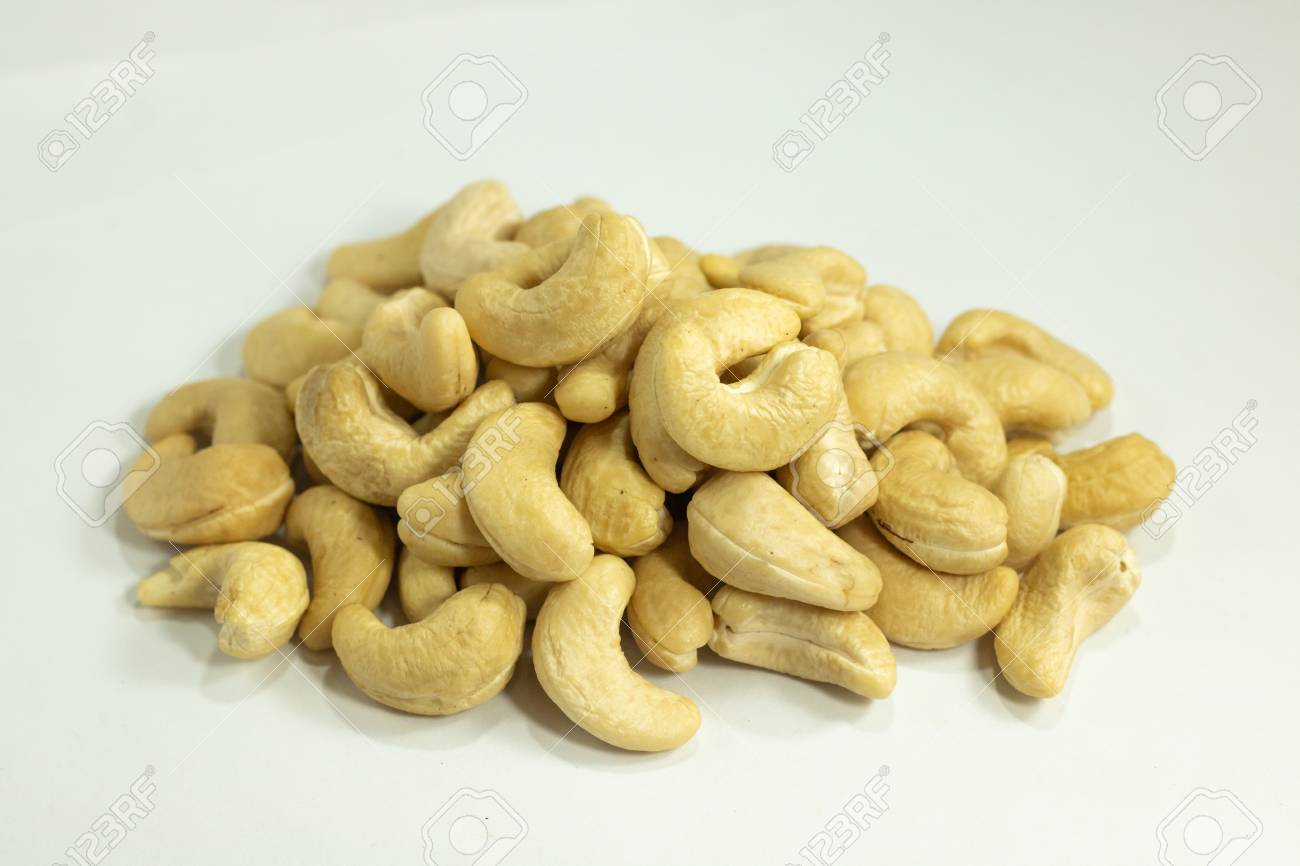 Cashew Nuts Heap Yellow Color Beans On White Background Stock Photo Picture And Royalty Free Image Image 104125157