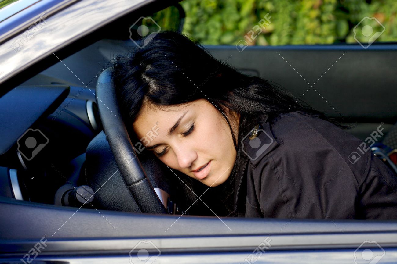Sleeping In Car >> Young Woman Sleeping In Car On Wheel Stock Photo Picture And Sleeping In Car >> Young Woman Sleeping In Car On Wheel Stock Photo Picture And