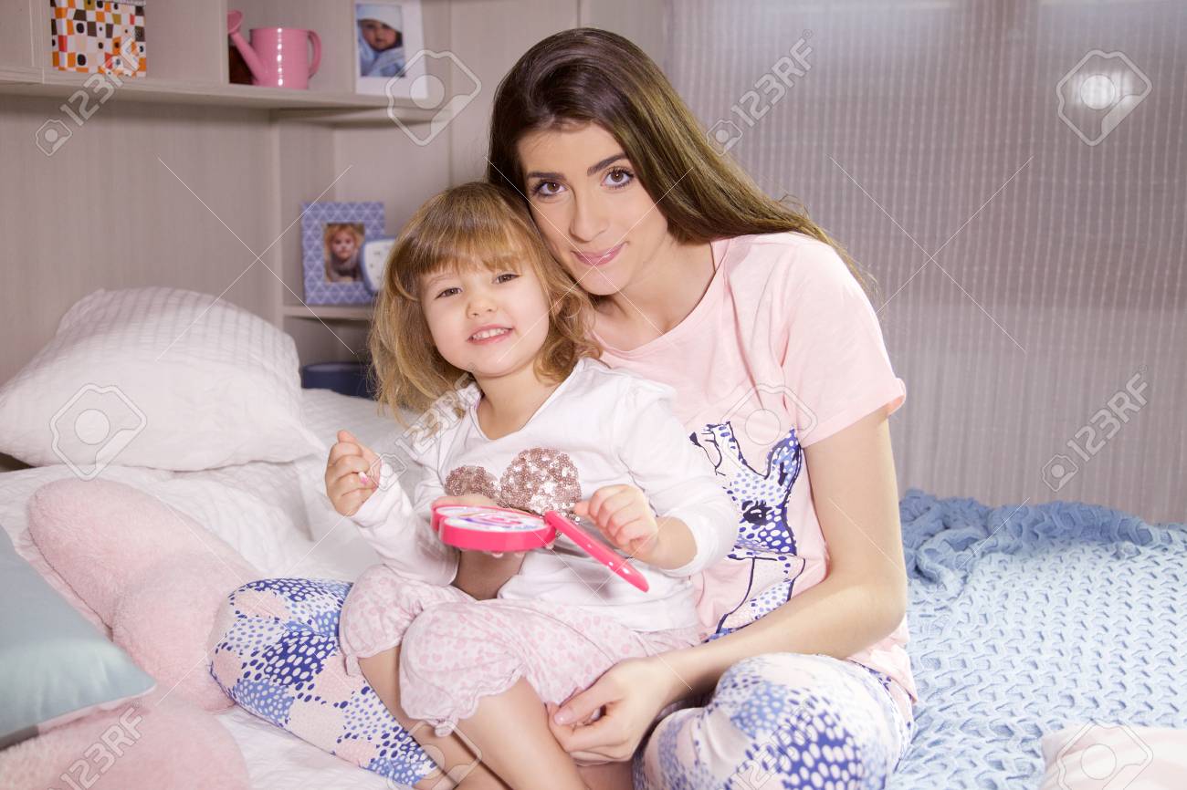 baby playing with makeup