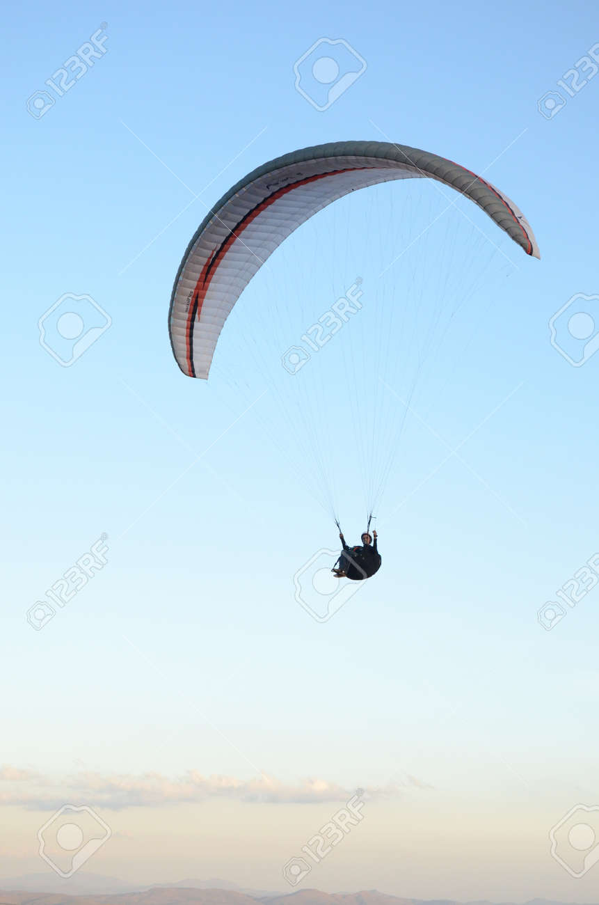 Paragliding at sun set in Topo do Mundo (translated to Top of the World) in Minas Gerais - 151596711 Paragliding at sun set in Topo do Mundo (translated to Top of the World) in Minas Gerais - 151596711