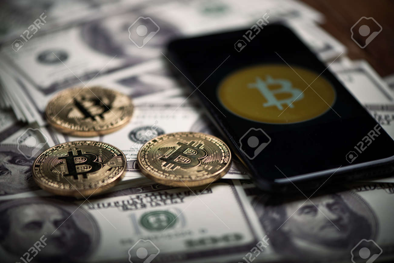 Bitcoin, The New Digital Cryptocurrency Sweeping Across The World, Being  Utilized On A Smartphone Close Up Stock Photo, Picture and Royalty Free  Image. Image 165985070.