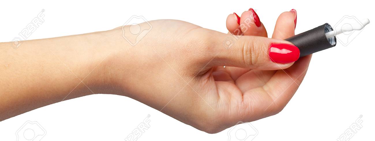 main femme avec du vernis à ongles isolé sur blanc banque d'images