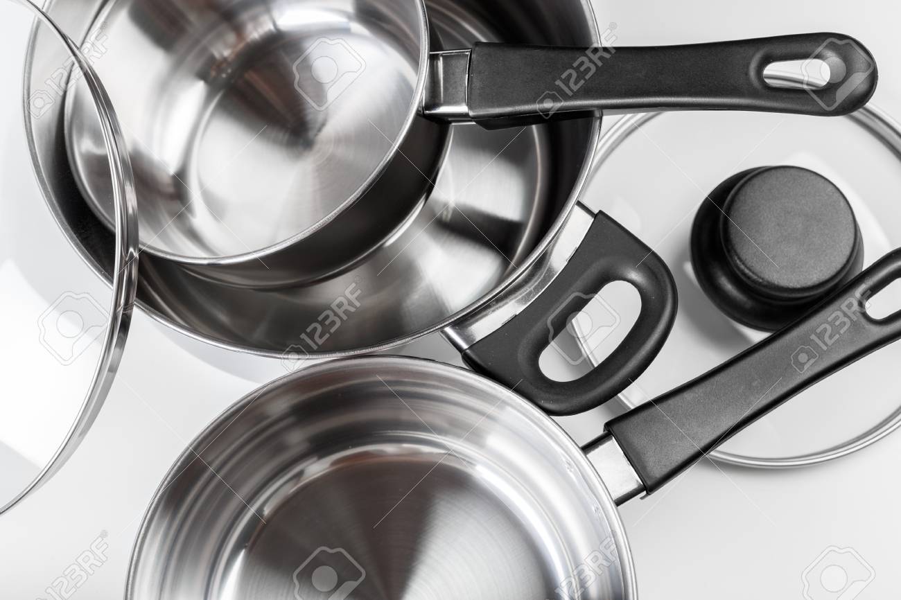 Stainless steel pots and pans isolated on white - 86306395 Stainless steel pots and pans isolated on white - 86306395