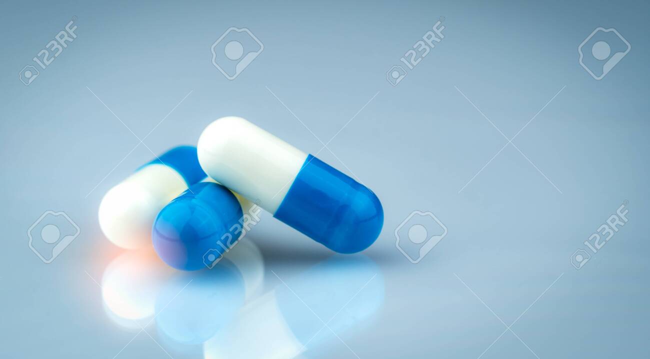 blue and white capsule