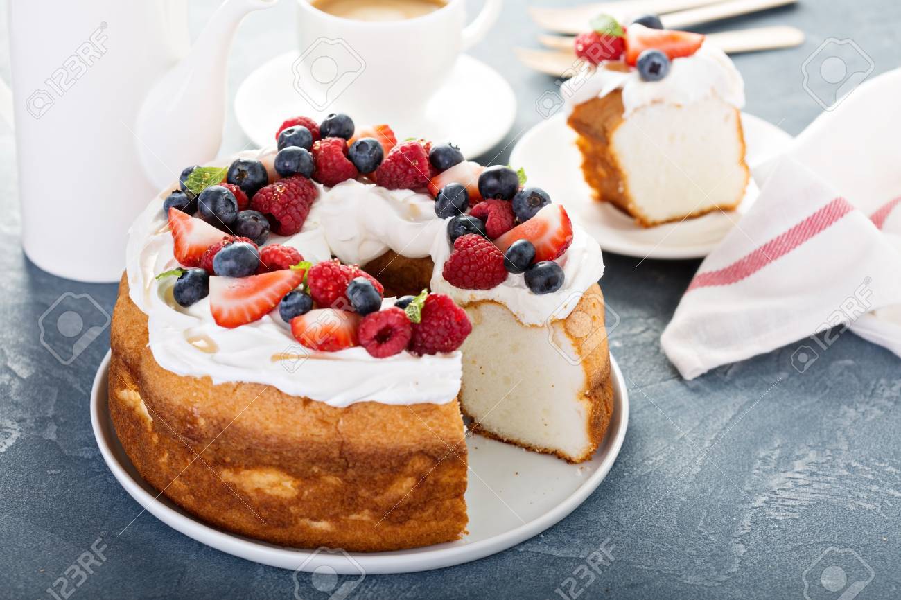 Angel Food Cake With Whipped Cream And Berries Stock Photo Picture And Royalty Free Image Image 81600295