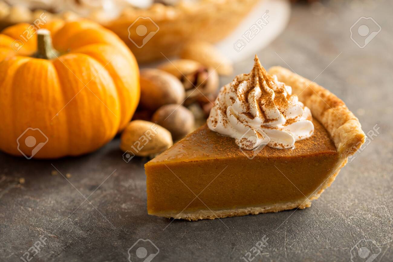 Traditional pumpkin pie with whipped cream - 130711416 Traditional pumpkin pie with whipped cream - 130711416