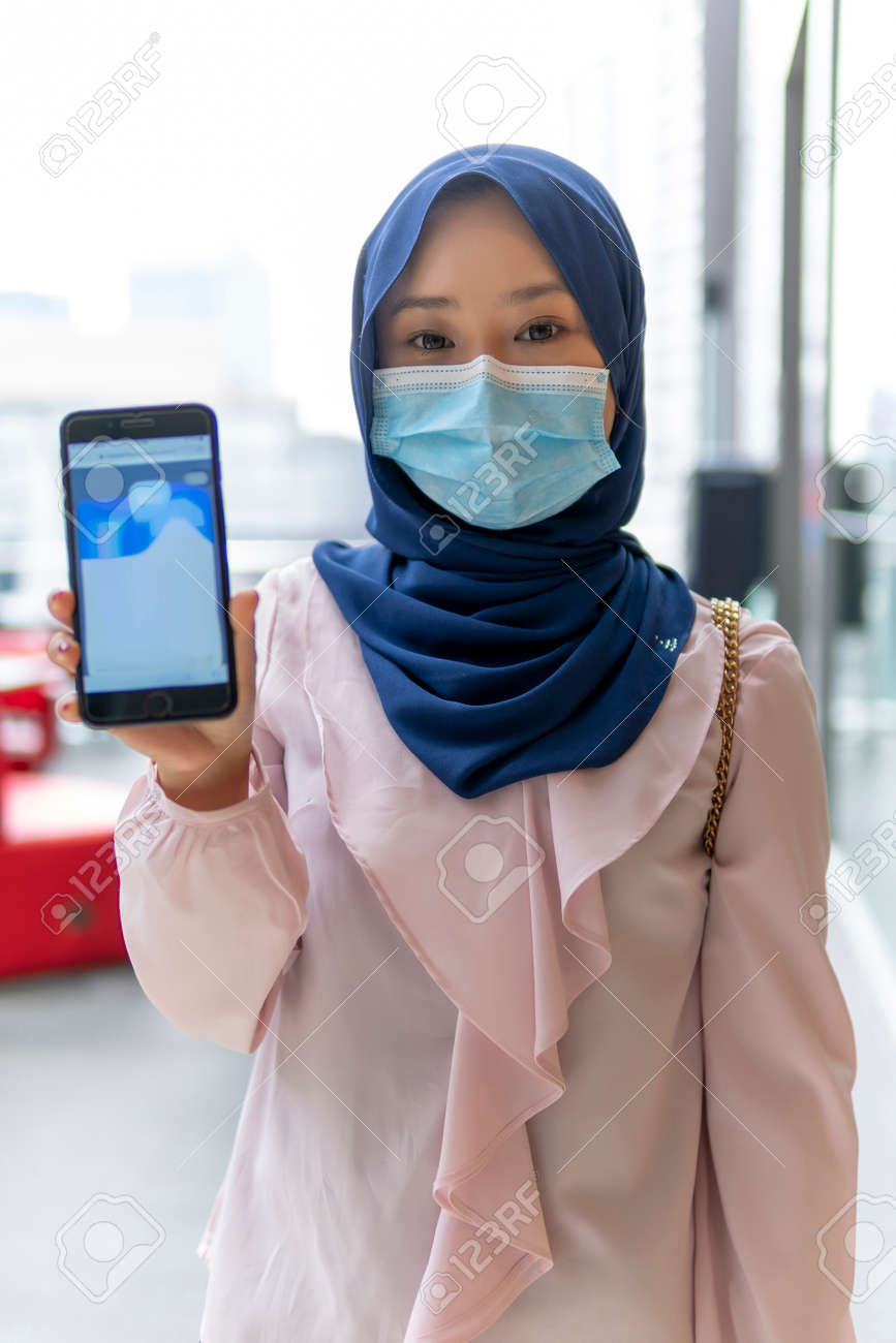 New Normal Concept Cute Malay Girl At Bench With No Sitting Marking For Social Distancing Stock Photo Picture And Royalty Free Image Image 164314116