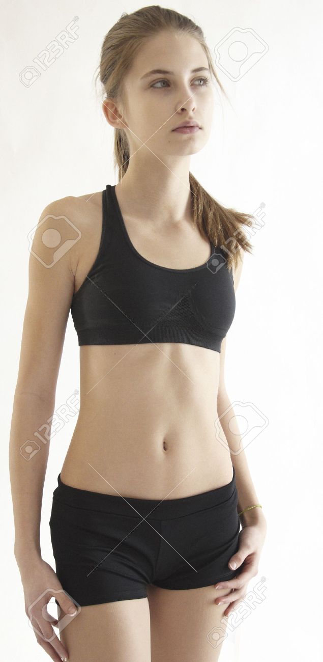 Fit Teen Girl Posing In Sports Bra And Shorts Stock Photo, Picture and  Royalty Free Image. Image 22070755.