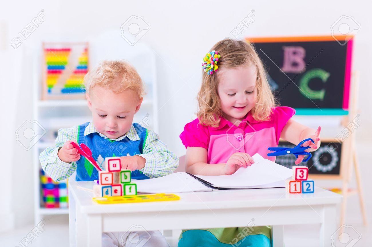 kids at preschool two children drawing and painting at kindergarten boy and girl happy - Children Painting Images kids at preschool two children drawing and painting at kindergarten boy and girl happy - Children Painting Images