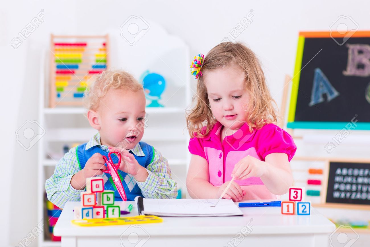 kids at preschool two children drawing and painting at kindergarten boy and girl happy - Children Painting Images kids at preschool two children drawing and painting at kindergarten boy and girl happy - Children Painting Images