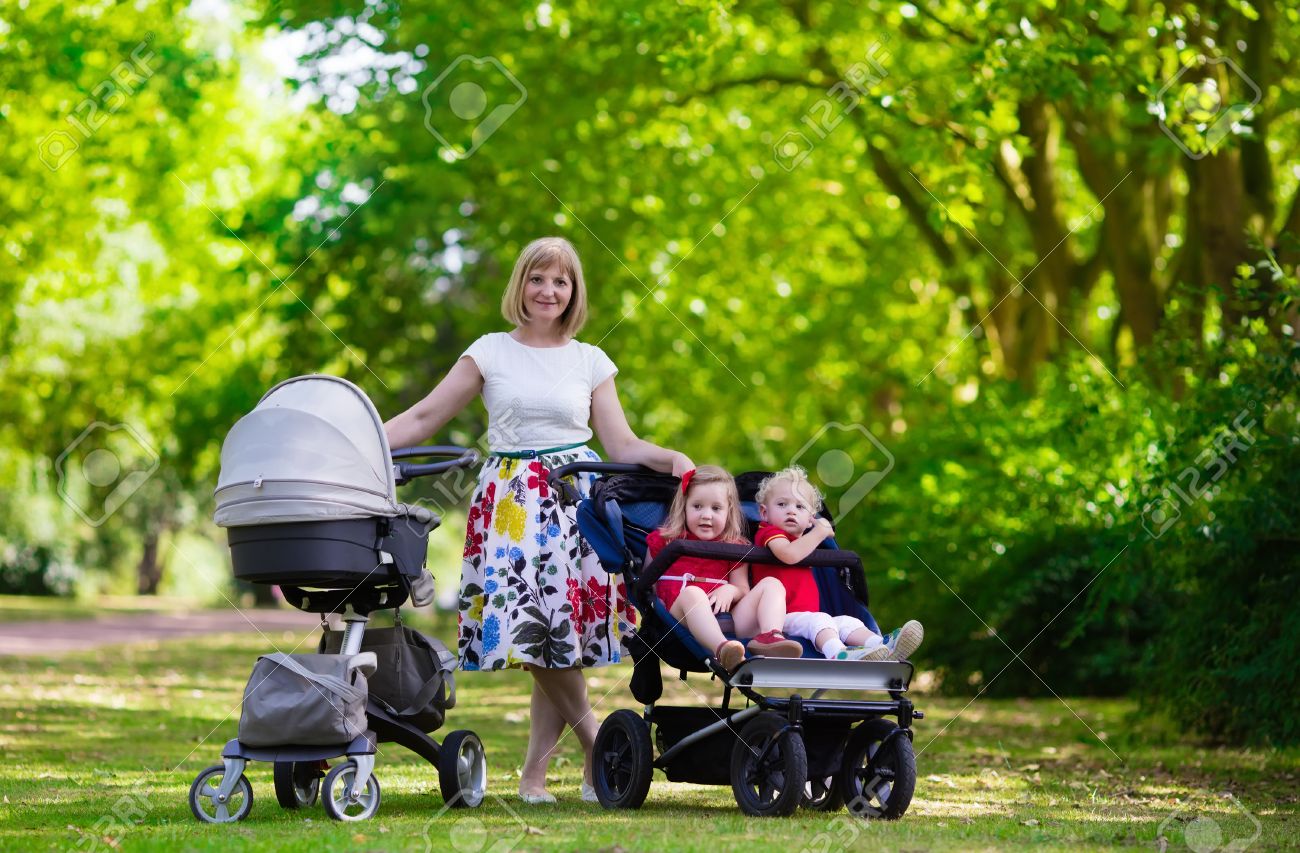 boy and girl double pushchair