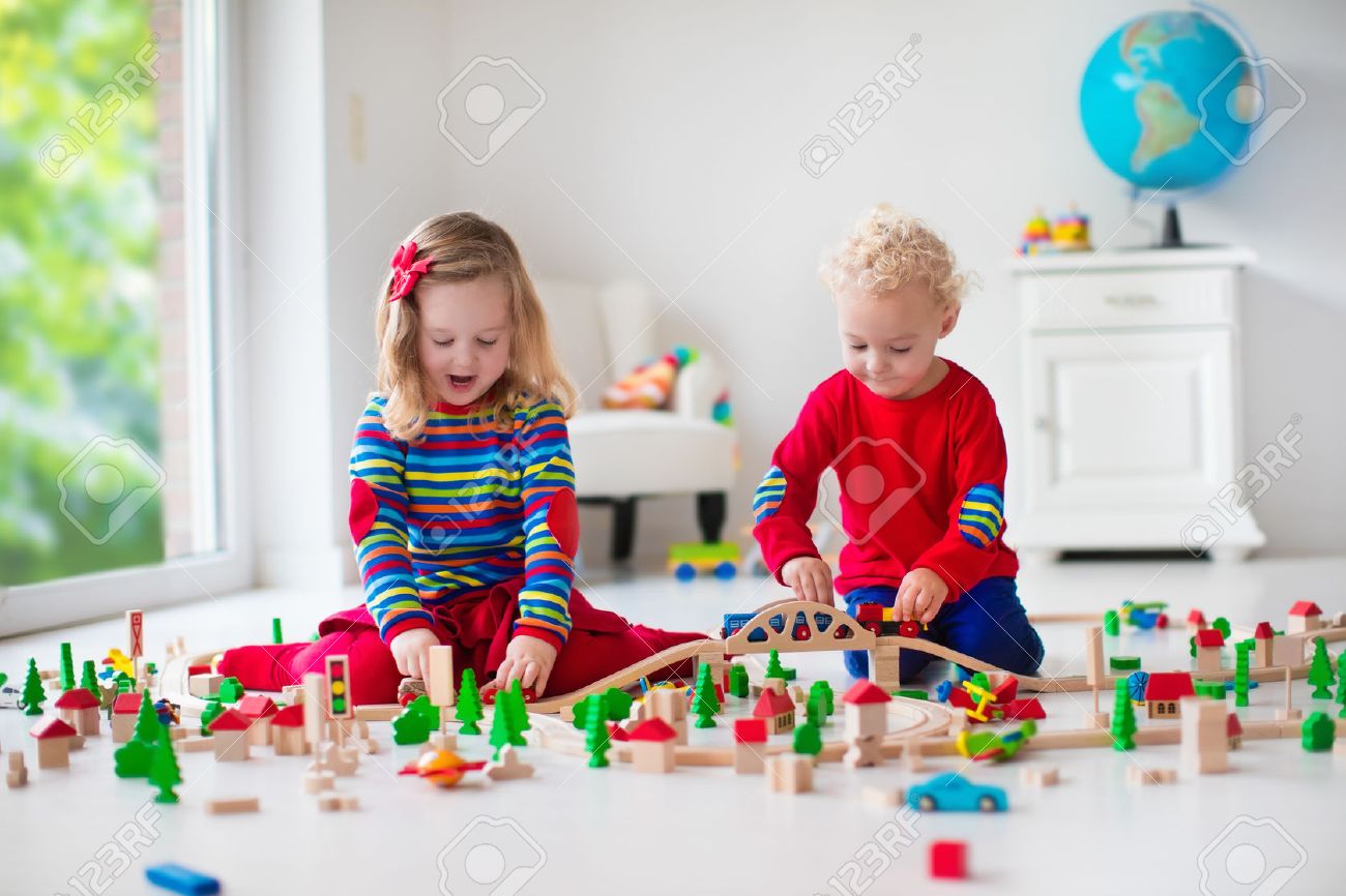 children playing with wooden train toddler kid and baby play children playing