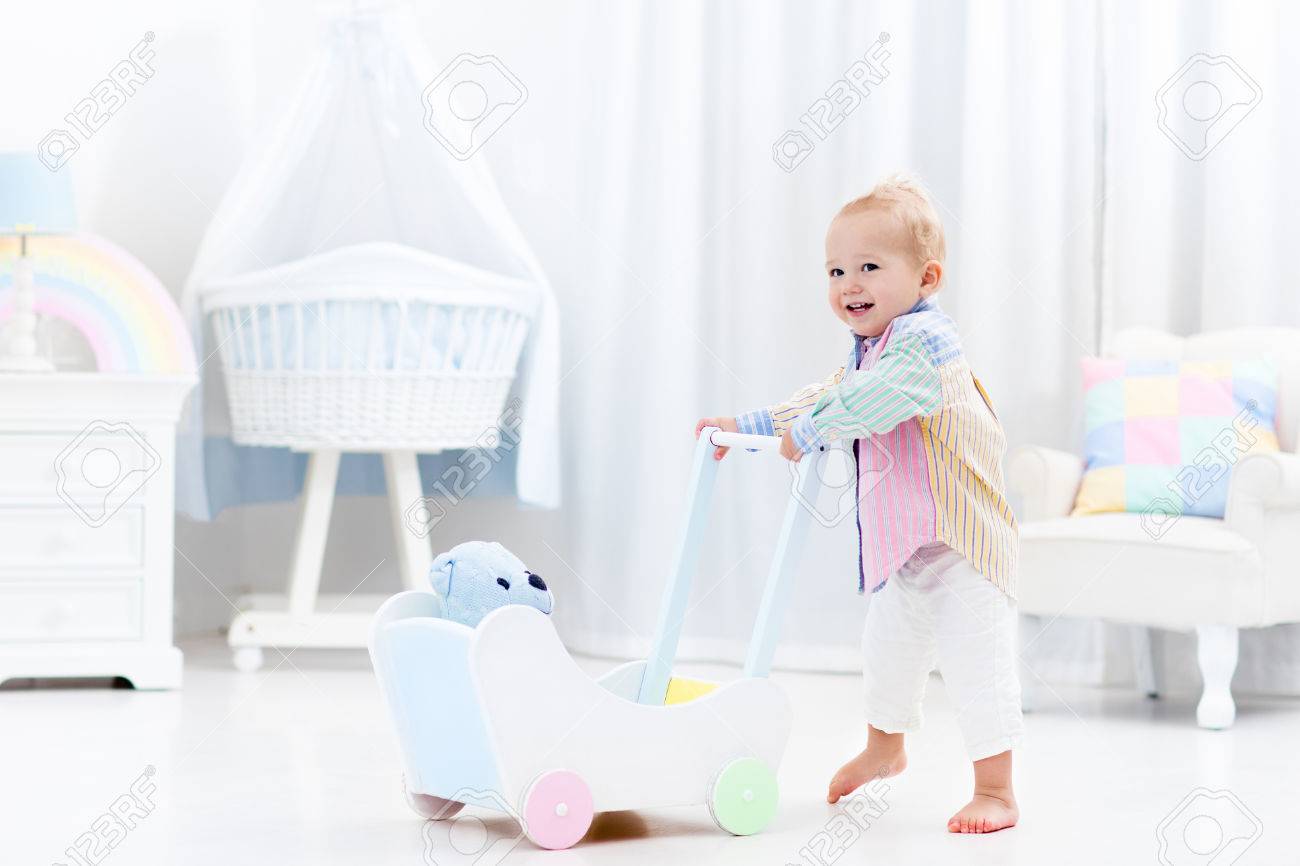 baby walking with push walker