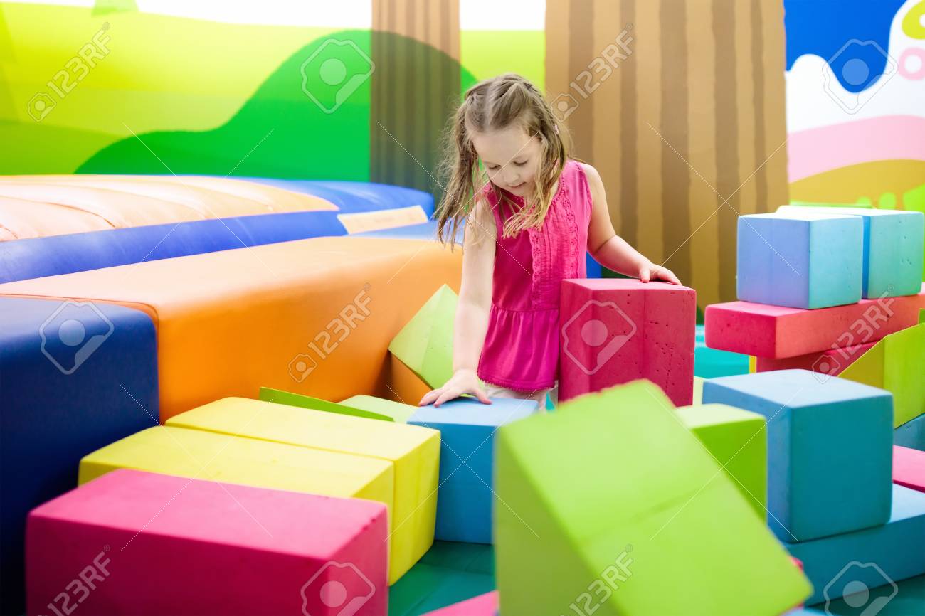 Child playing with colorful construction toy blocks. Educational.. Child playing with colorful construction toy blocks. Educational..