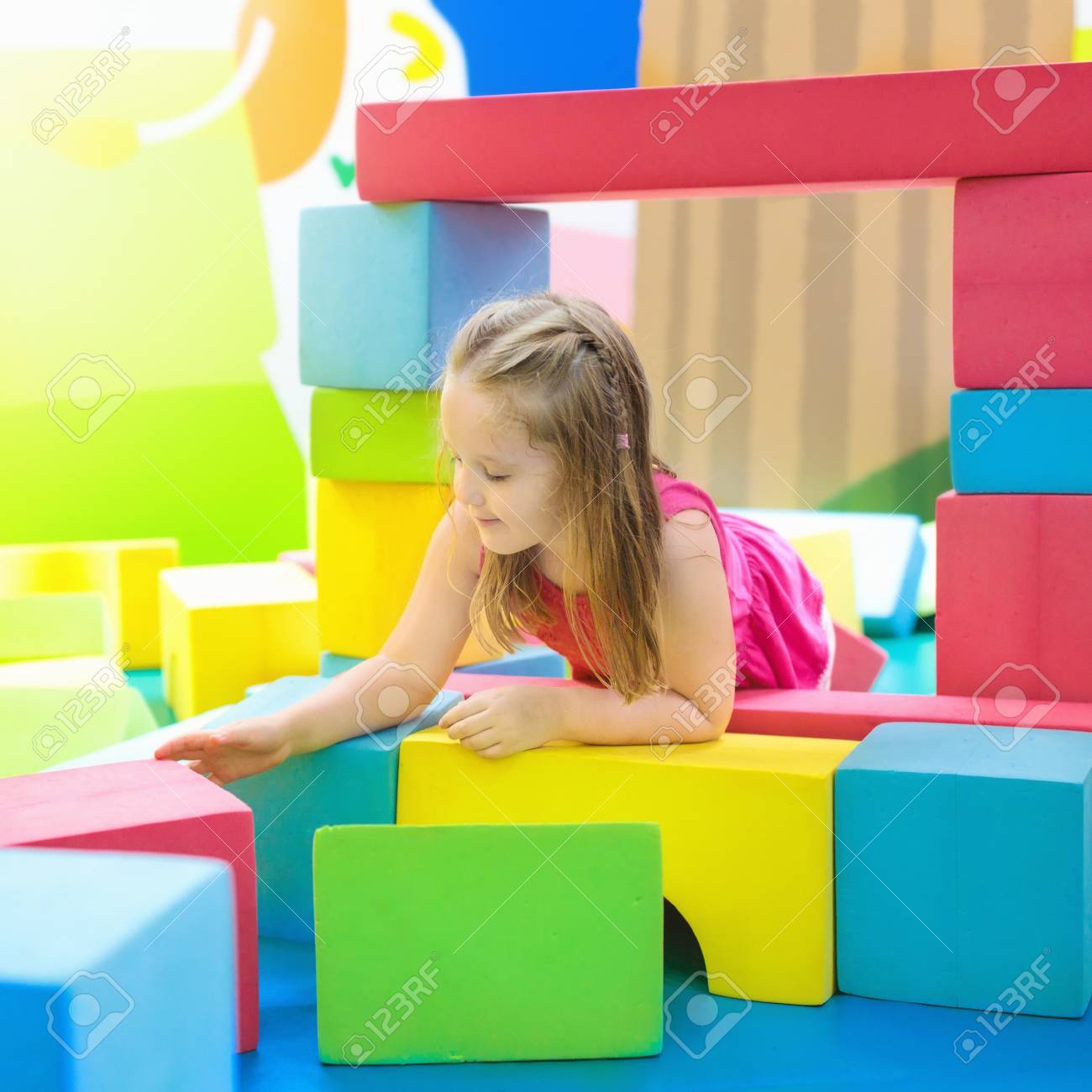 Child playing with colorful construction toy blocks. Educational.. Child playing with colorful construction toy blocks. Educational..