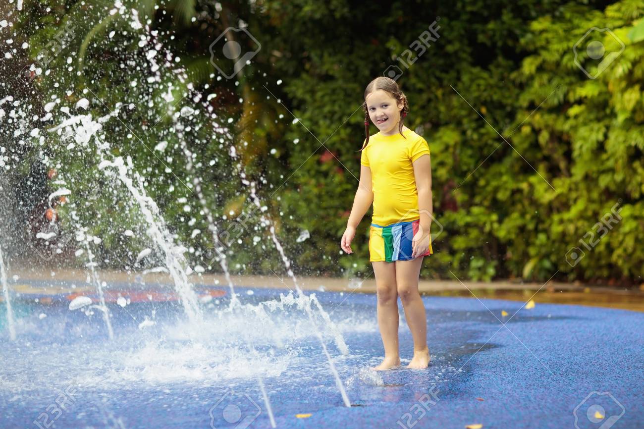 Kids Play In Aqua Park Children At Water Playground Of Tropical Stock Photo Picture And Royalty Free Image Image 108993784